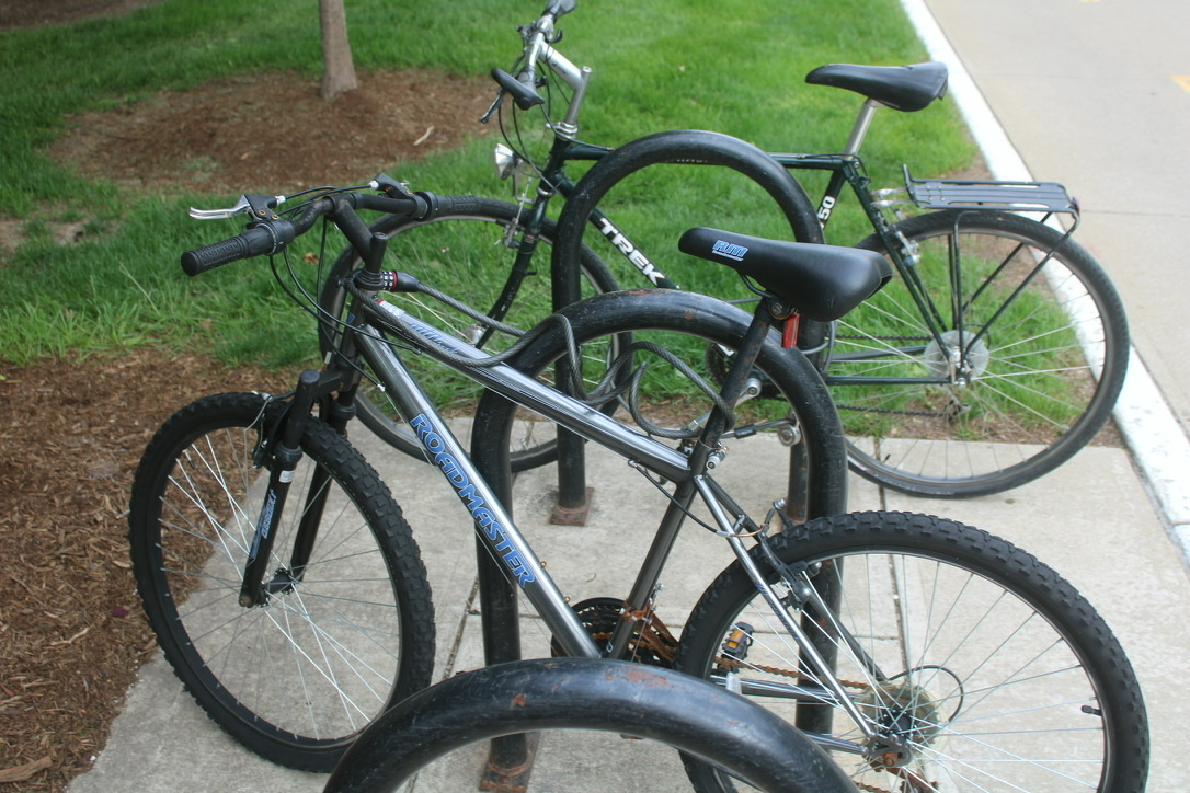a chain lock around a bike&rsquo;s handlebar and seat post, but not around either chassis or wheel