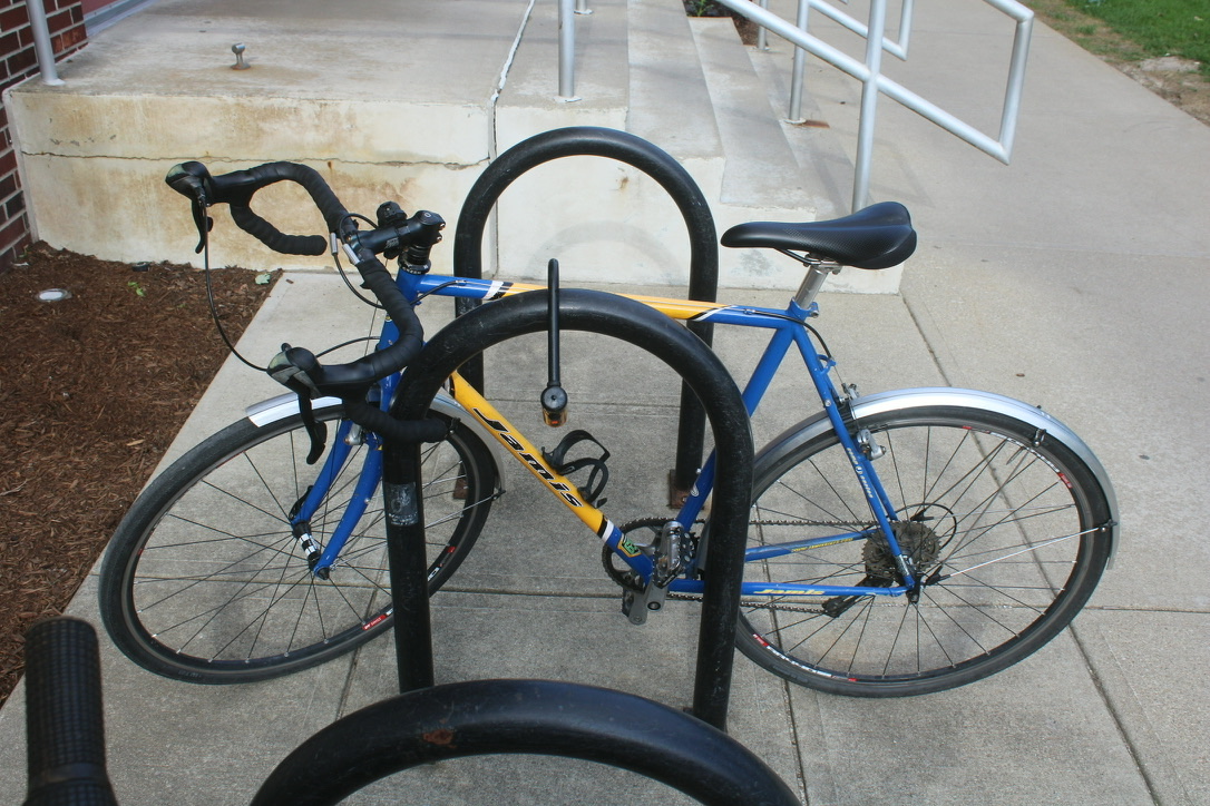 a bike rack locked to the chassis, on a well-maintained road bike